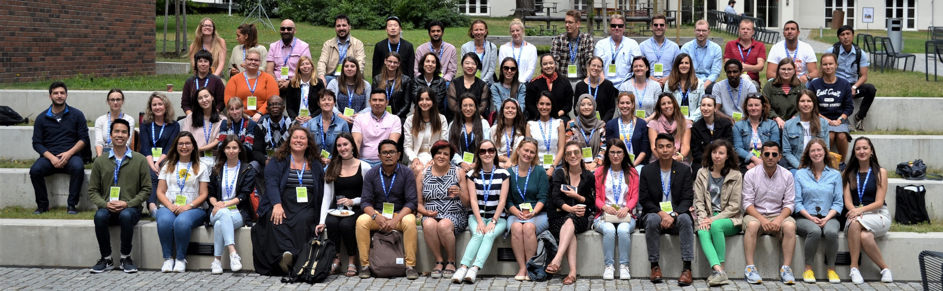 Large group of happy doctoral students at a Summer School in Brno